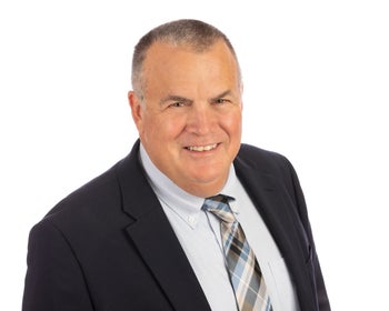 Portrait of Tim Hopkins, Broker Co-Owner